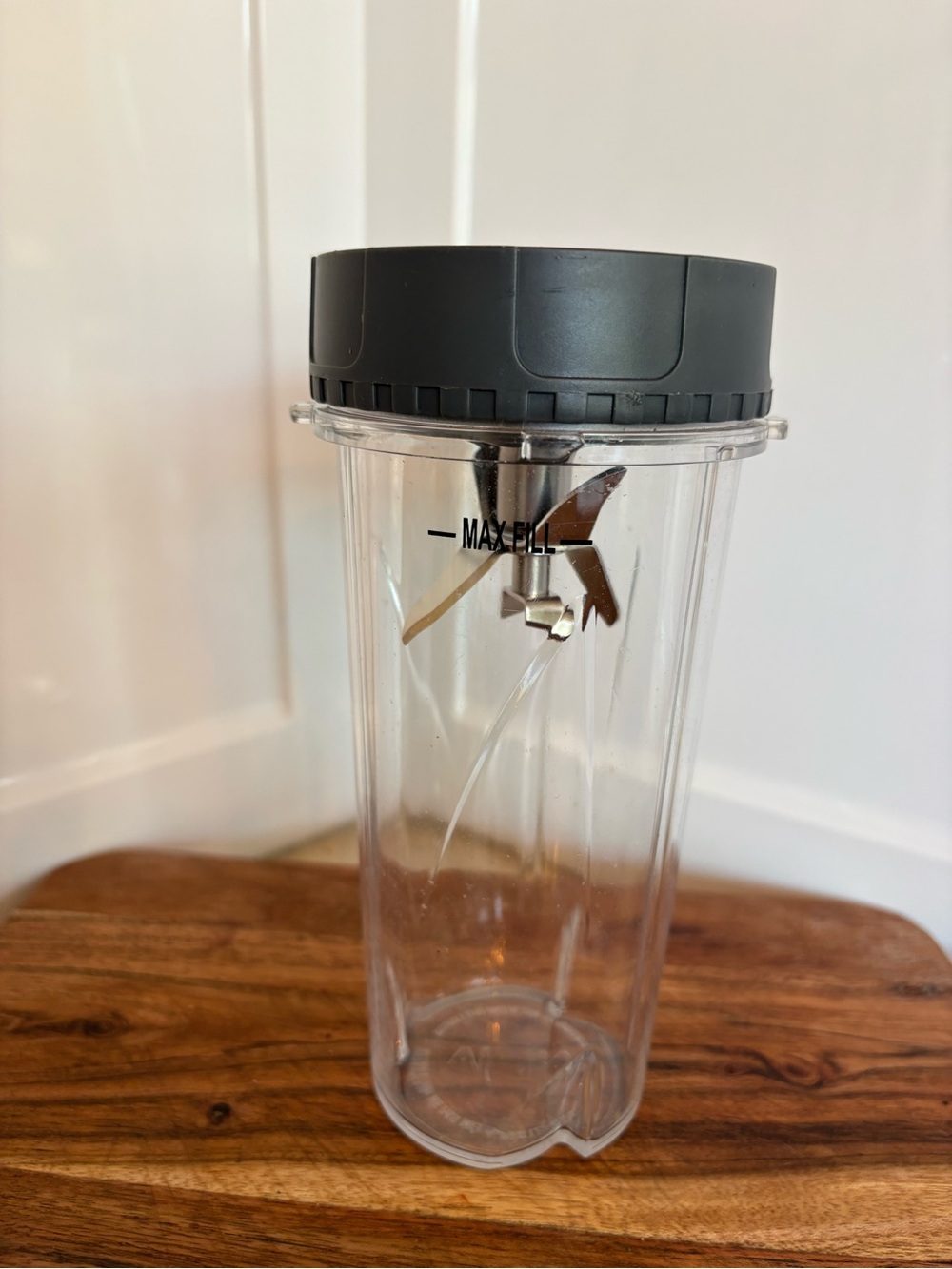 16-ounce single-serve Ninja blender cup with a dark gray lid